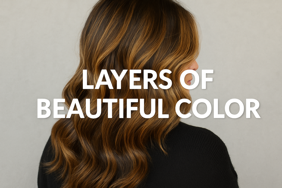 Landscape photo of a woman with long, wavy brunette hair blended with golden highlights, styled in soft layers, with bold white text reading ‘Layers of Beautiful Color.